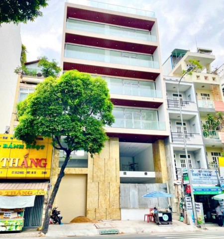 Tòa nhà cho thuê mặt tiền 75-77-79 Phổ Quang Quận Tân Bình
